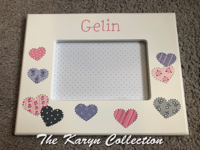 Gelin's patchwork hearts frame in pinks, lavenders and gray